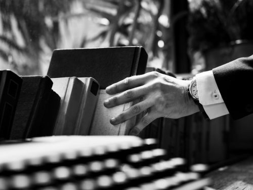 Closeup of hand getting a book